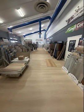 Showroom aisle with tile and flooring material displays