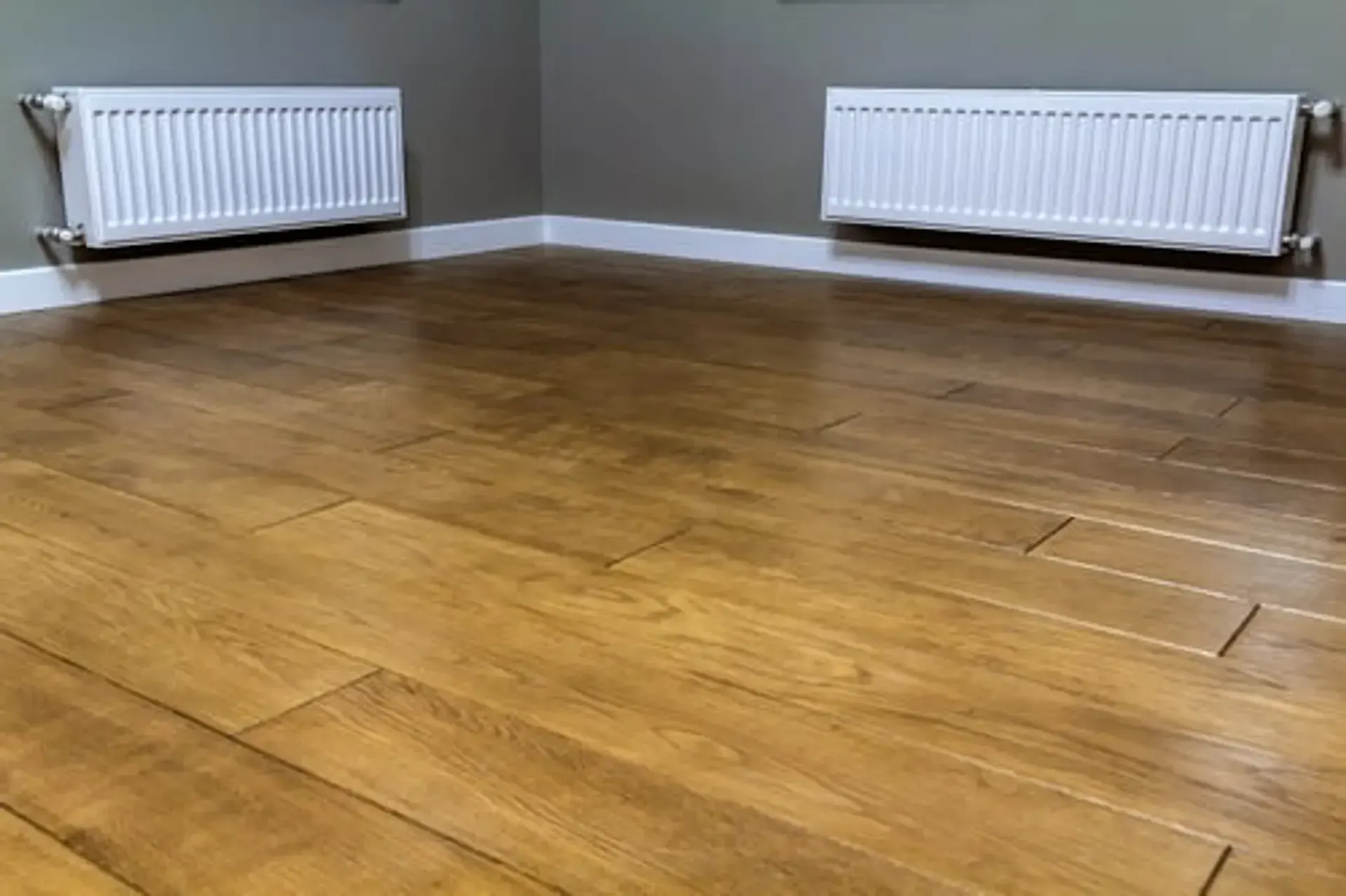 Finished hardwood flooring in a Vacaville, CA living room installed by EZ Floors & More